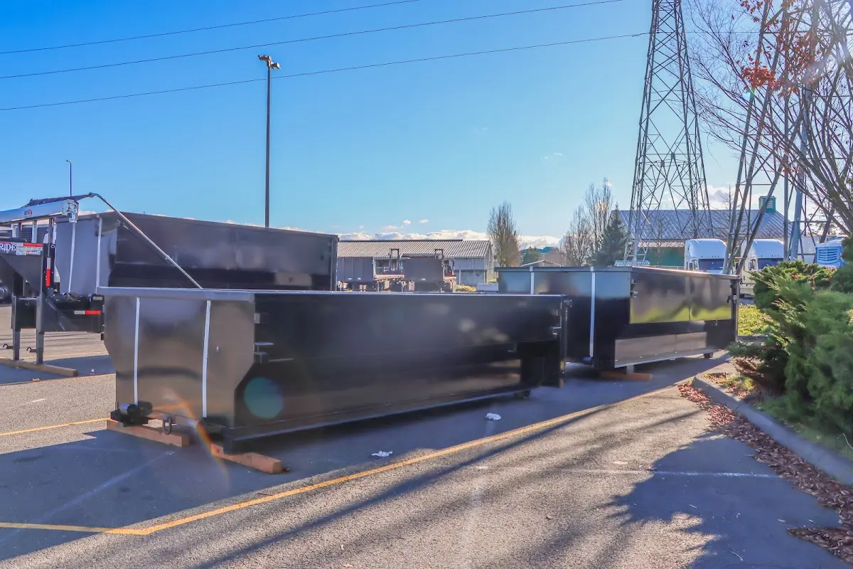 Roll-off dumpster ready for waste disposal at job site for Estate Cleanout Dumpster Rental in Two Rivers